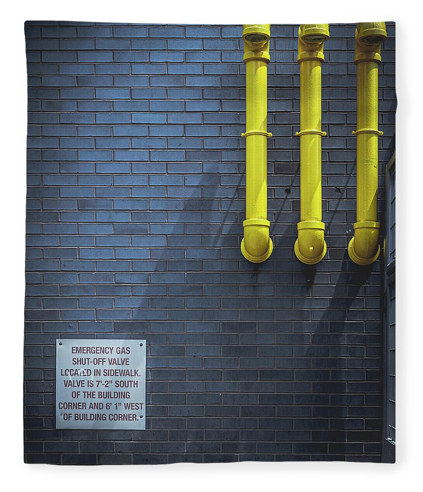 Yellow Pipes Fleece Blanket featuring the photograph yellow pipes - Queens, NY by Steve Stanger