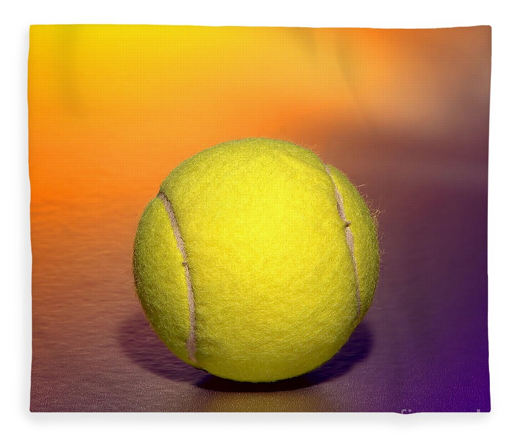Background Fleece Blanket featuring the photograph Yellow Tennis Sport Ball over Purple Background by Olivier Le Queinec