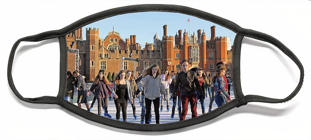 Ice Skating At Hampton Court Palace Ice Rink England Uk Face Mask featuring the photograph Ice skating at Hampton Court Palace ice rink England UK #13 by Julia Gavin