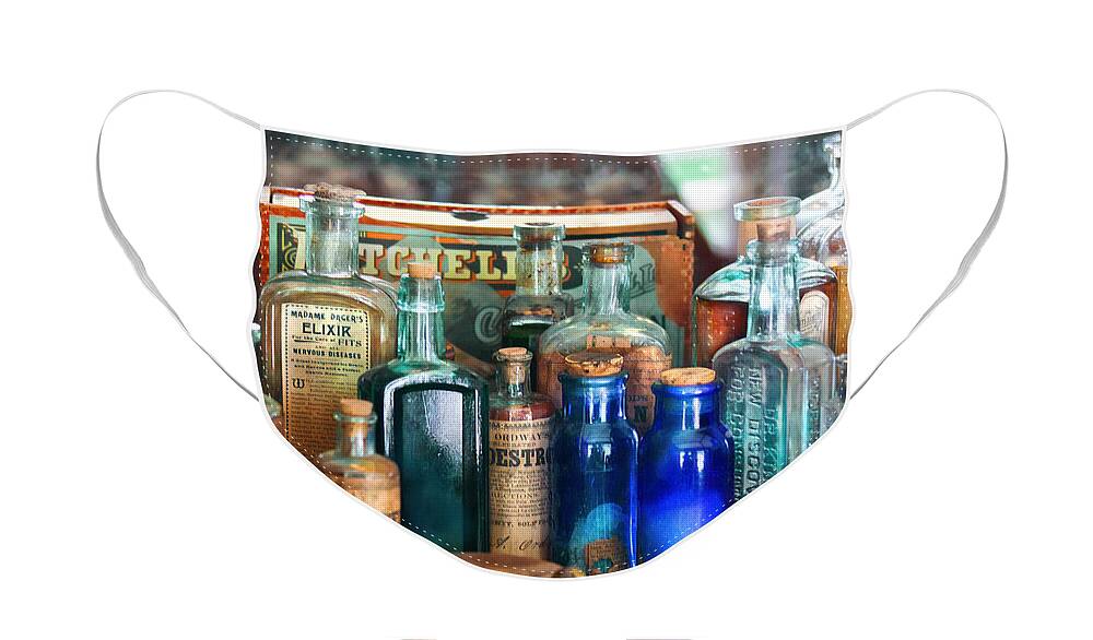 Pharmacy Face Mask featuring the photograph Apothecary - Remedies for the Fits by Mike Savad