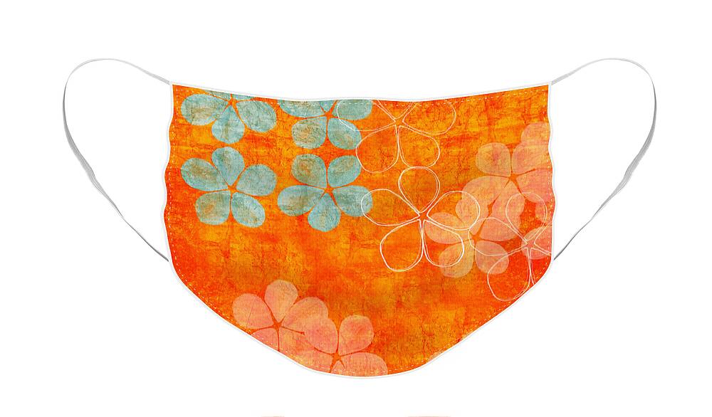 Abstract Face Mask featuring the painting Blue Blossom on Orange by Linda Woods