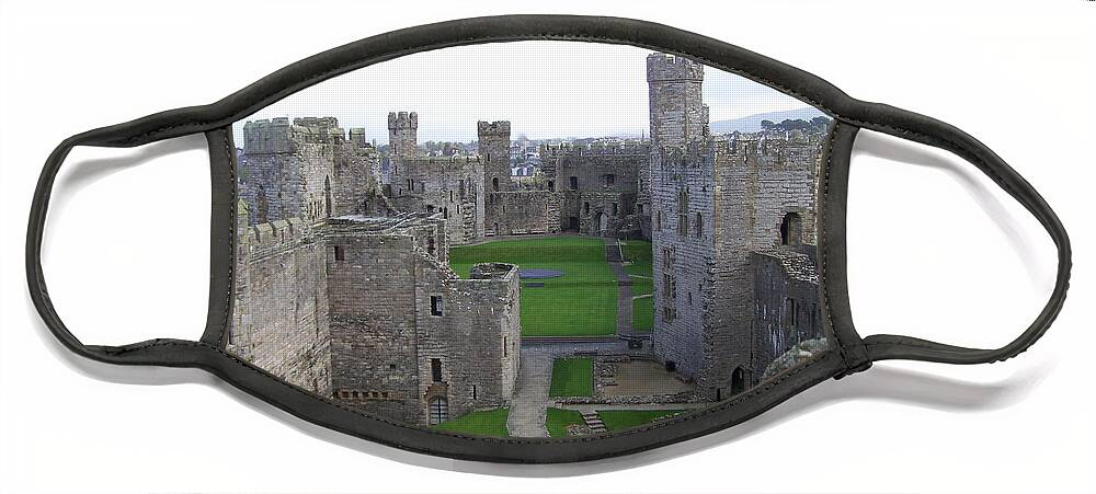 Castles Face Mask featuring the photograph Caernarfon castle by Christopher Rowlands