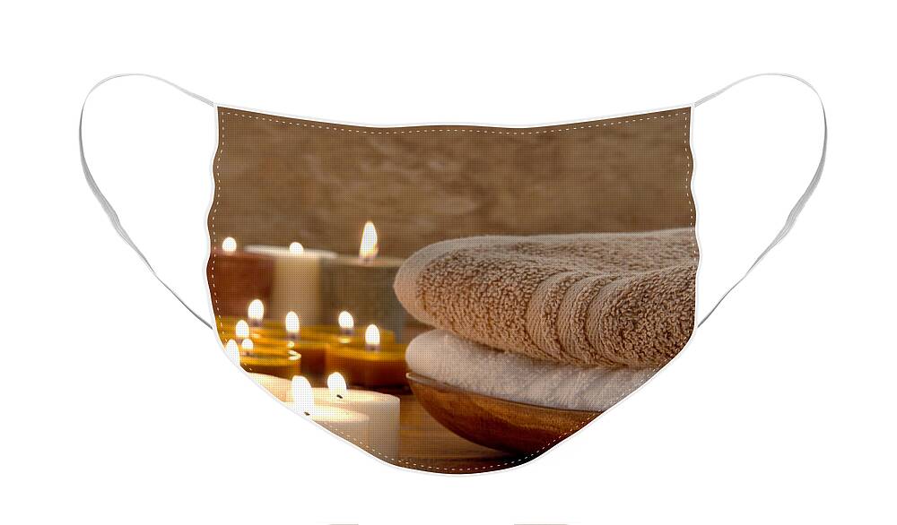 Spa Face Mask featuring the photograph Candles and Towels in a Spa by Olivier Le Queinec