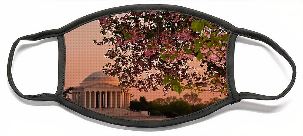 America Face Mask featuring the photograph Cherry Blossoms Framing the Jefferson Memorial at Sunset by Mitchell R Grosky