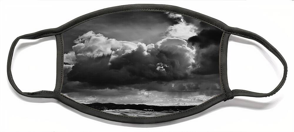 Clouds Face Mask featuring the photograph Dark Clouds Over Snowy Landscape by Theresa Tahara