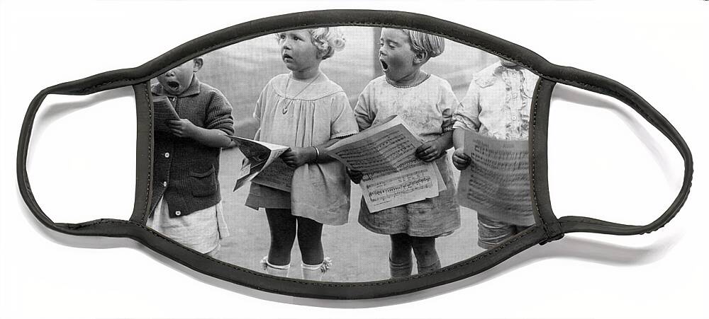 1917 Face Mask featuring the photograph Four Young Children Singing by Underwood Archives