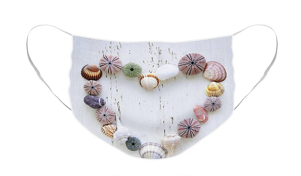 Heart Face Mask featuring the photograph Heart of seashells and rocks by Elena Elisseeva