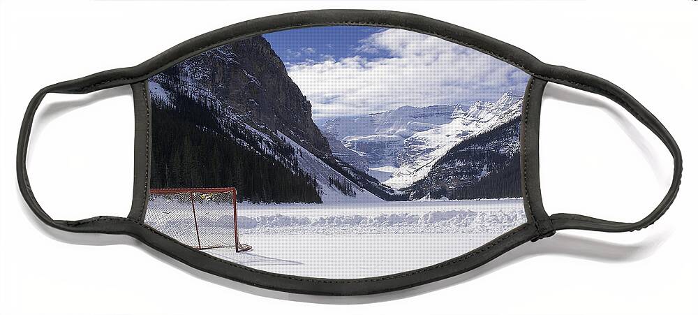Alberta Face Mask featuring the photograph Lake Louise Hockey Net by Bill Cubitt