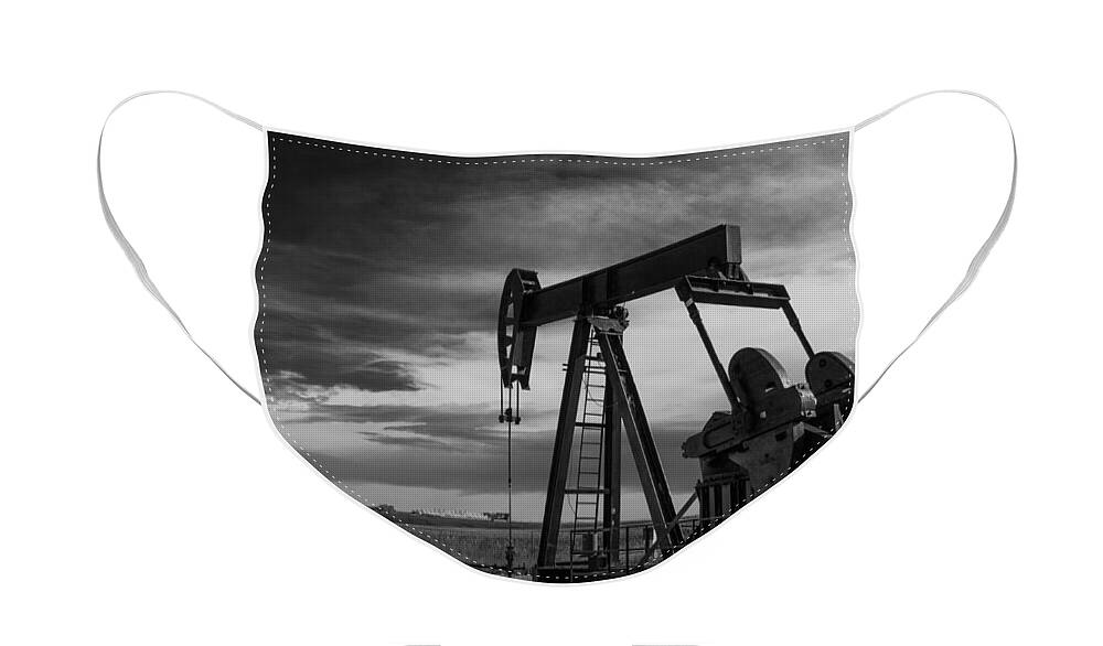Oil Face Mask featuring the photograph Pumpjack at Work Near Denver International Airport by Tony Hake