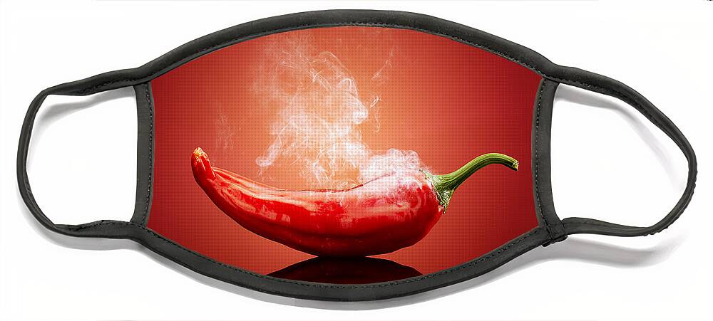 Chillichiliredsmokesmokinghotburnburningsteamsteamingcapsicumcayennejalapenopaprikapeppergradientbackgroundreflectionreflectivetablestudioshotvegetablefreshconceptconceptualstilllifefoodripeimageonenobodyphotographindoors001019xs Face Mask featuring the photograph Steaming hot Chilli by Johan Swanepoel