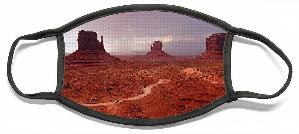 Monument Valley Face Mask featuring the photograph Storms moving through Monument Valley by Keith Stokes