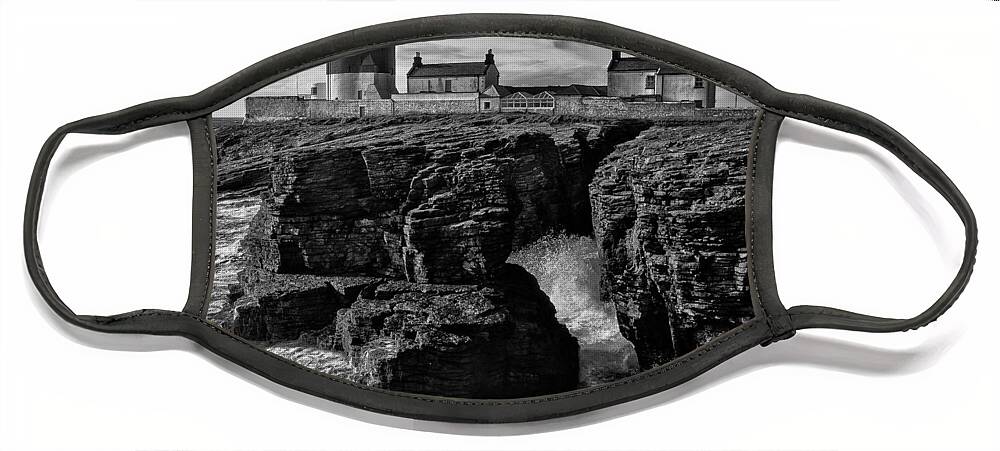 Hook Face Mask featuring the photograph Stormy day at Hook Head Lighthouse by Nigel R Bell