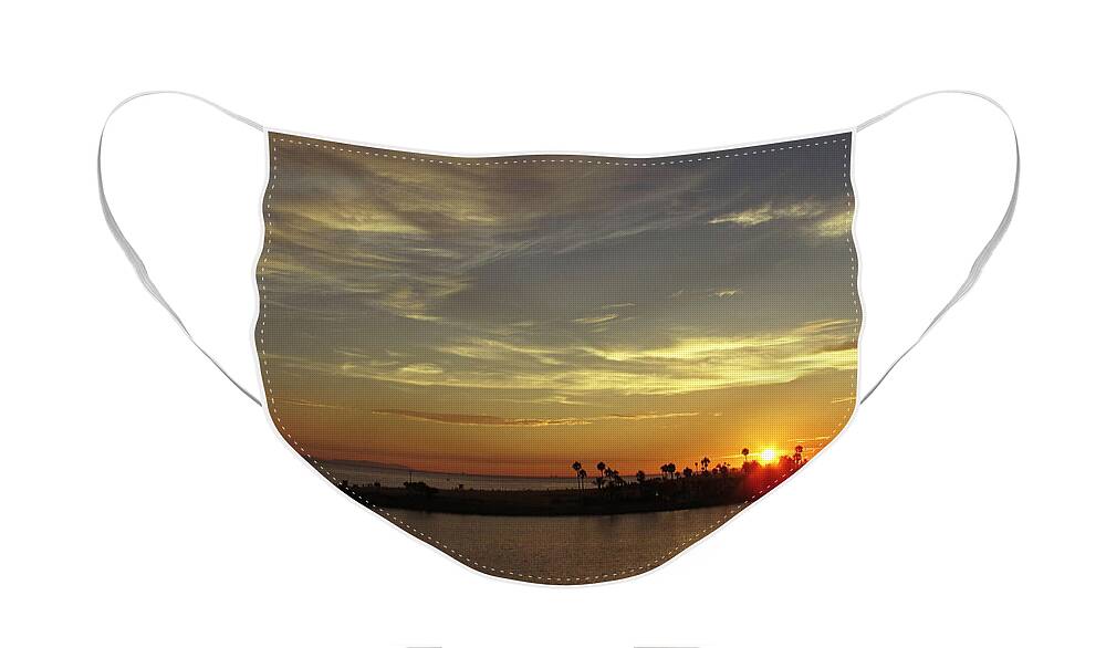 Ocean Face Mask featuring the photograph Sunset Over Jetty Point by Kelly Holm