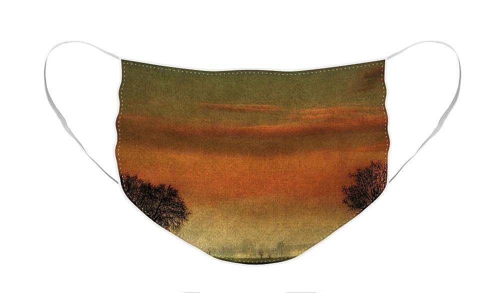 Albairate Face Mask featuring the photograph Sunset over the country by Roberto Pagani