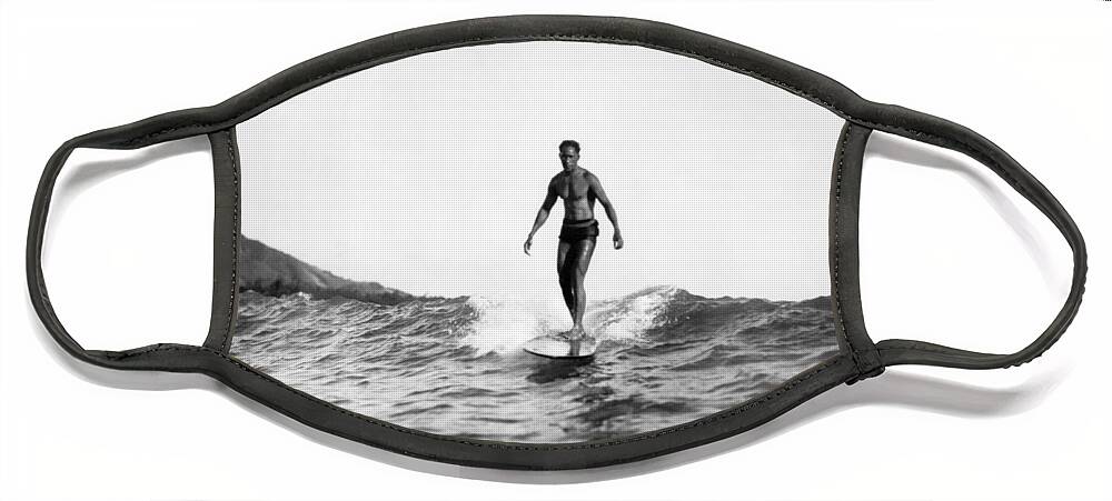 1929 Face Mask featuring the photograph Surfing At Waikiki Beach by Underwood Archives