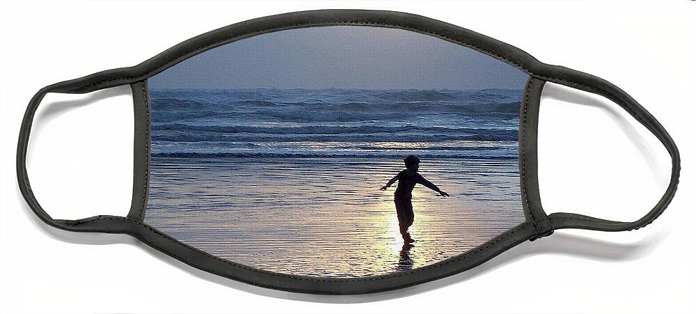 Beach Face Mask featuring the photograph Dancing Boy at Sunset by Peter Mooyman