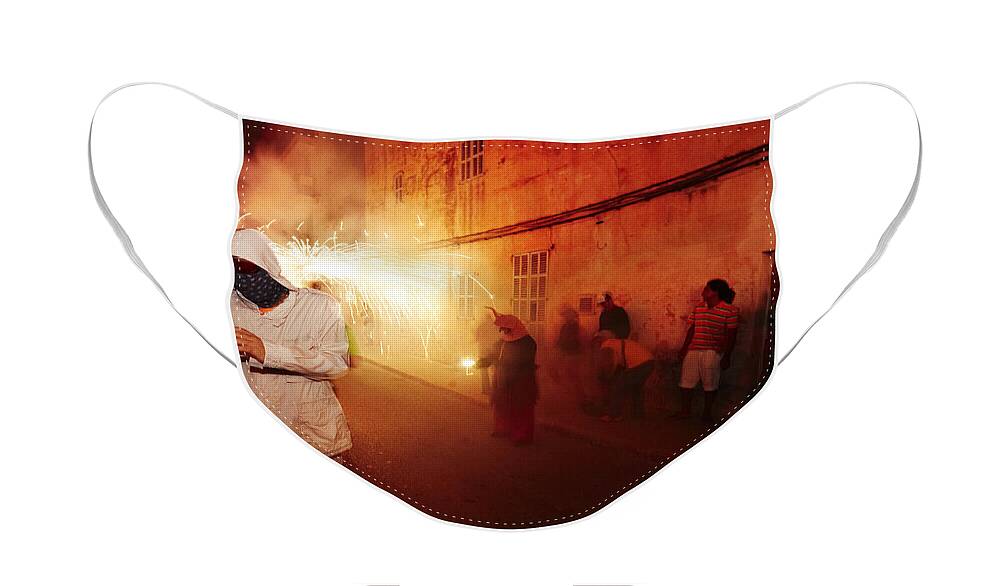 Fuego Face Mask featuring the photograph Demons in the street by Agusti Pardo Rossello