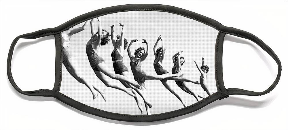 1930's Face Mask featuring the photograph Graceful Line Of Beach Dancers by Underwood Archives
