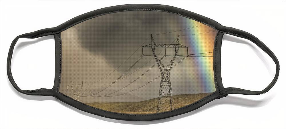 00441044 Face Mask featuring the photograph Rainbow Over Powerlines by Colin Monteath