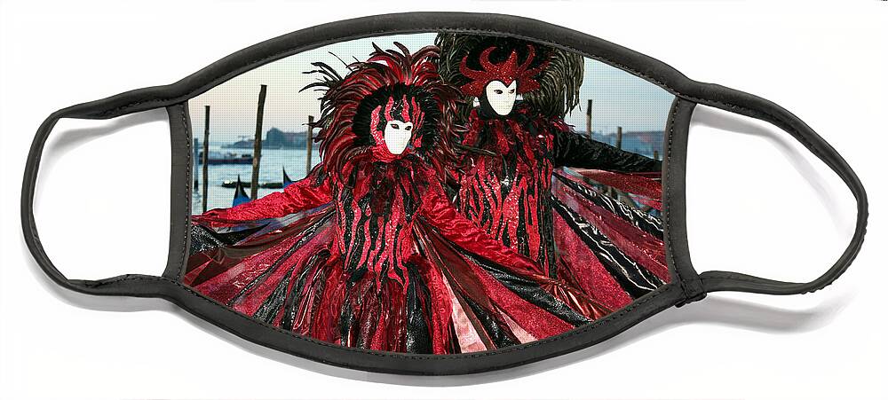 Venice Carnival Face Mask featuring the photograph Red and Black Winged Couple at Sunrise by Donna Corless