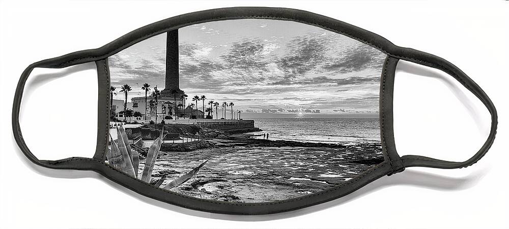 Andalucia Face Mask featuring the photograph Sunset At Chipiona Lighthouse Cadiz Spain #1 by Pablo Avanzini