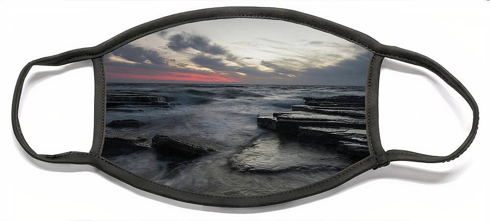 Seascape Face Mask featuring the photograph Shipwreck of an abandoned ship on a rocky shore by Michalakis Ppalis