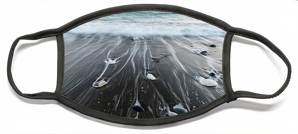 Seascape Face Mask featuring the photograph Pebbles in the beach and flowing sea water by Michalakis Ppalis