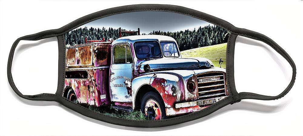 Old Fire Truck Face Mask featuring the photograph Abandoned fire-truck by Paul MAURICE