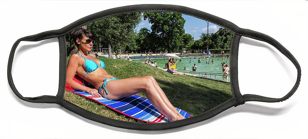 Deep Eddy Pool Face Mask featuring the photograph Attractive model in bikini at Deep Eddy Pool, sunbathing on sunny day in Austin, Texas by Dan Herron