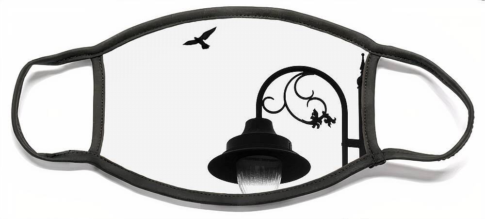 Flying Dove Face Mask featuring the photograph Bird and Street Lamp in Black and White by Prakash Ghai
