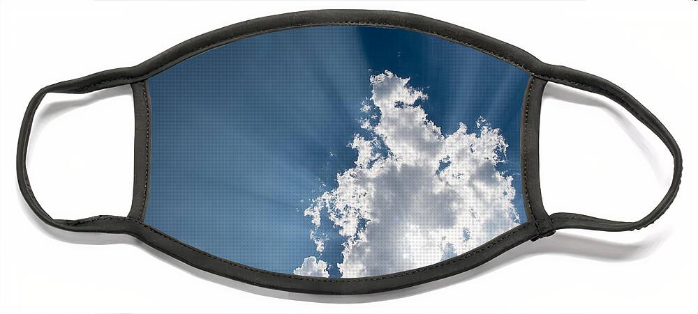 Atmosphere Face Mask featuring the photograph Blue sky with white clouds and sun rays by Michalakis Ppalis