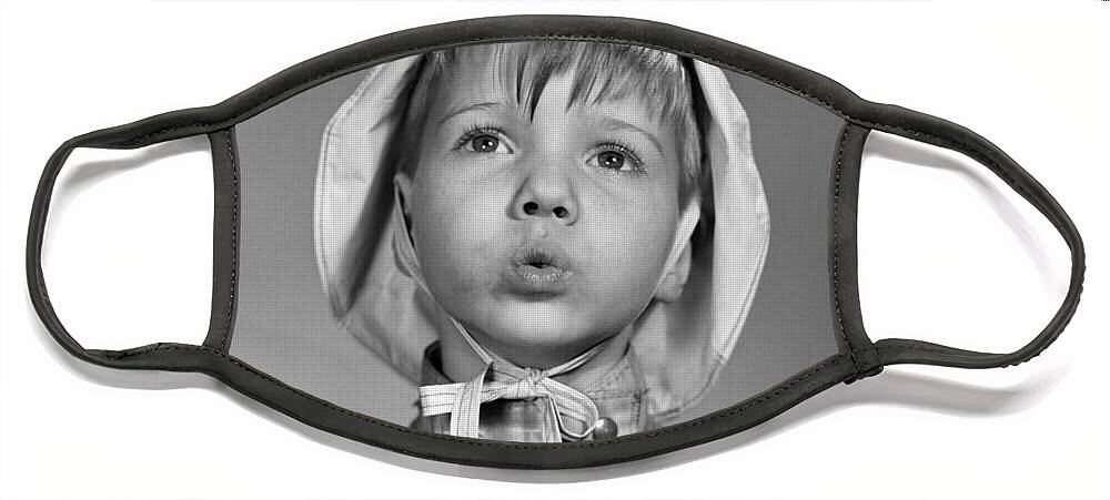 1950s Face Mask featuring the photograph Boy In Rain Gear, C.1950s by Debrocke/ClassicStock