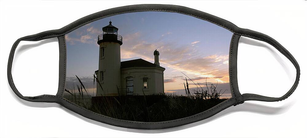 Denise Bruchman Face Mask featuring the photograph Coquille River Lighthouse at Sunset by Denise Bruchman