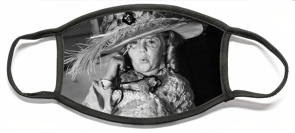 1950s Face Mask featuring the photograph Girl Playing Dress-up, C.1950s by H. Armstrong Roberts/ClassicStock