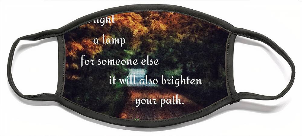 If You Light A Lamp For Someone Else It Will Also Brighten Your Path.-buddha Nature Face Mask featuring the photograph Light the way by Christine Paris