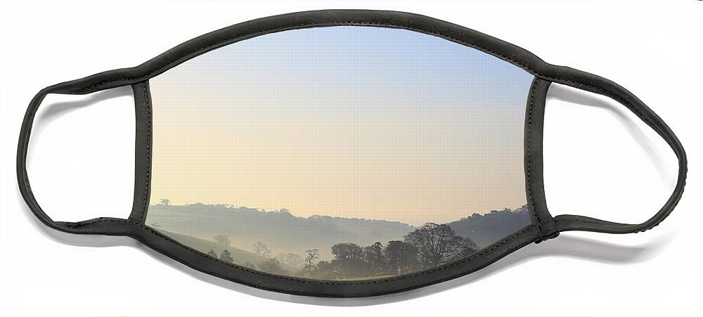 Misty Face Mask featuring the photograph Misty dawn over the Cornish countryside by Tony Mills