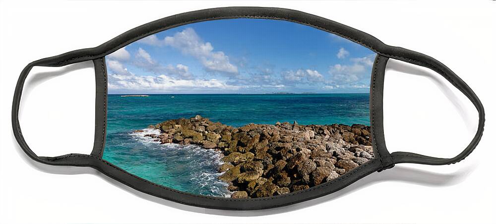 Atlantic Ocean Face Mask featuring the photograph Rocky Shoreline on the Beach at Atlantis Resort by Amy Cicconi