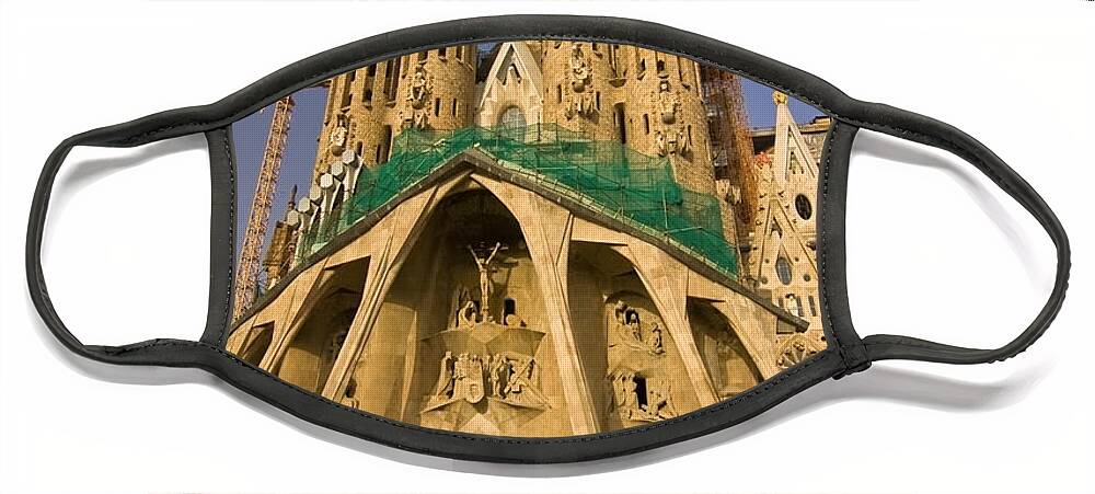 Sagrada Famila Face Mask featuring the photograph Sagrada Famila in the fading sun. by Sven Brogren