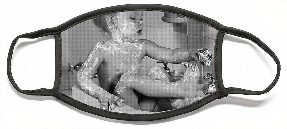 1940s Face Mask featuring the photograph Soapy Girl In Sink, C.1940s by H Armstrong Roberts ClassicStock