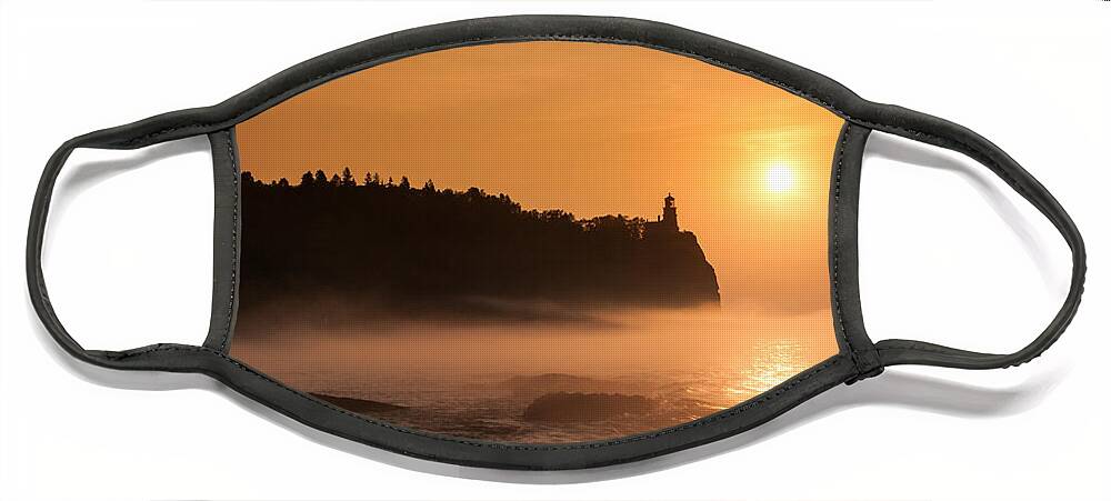 Atmosphere Face Mask featuring the photograph Split Rock's Morning Glow by Rikk Flohr