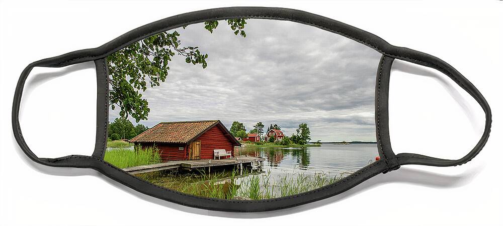 The Old Boat-house Face Mask featuring the photograph The old boat-house by Torbjorn Swenelius