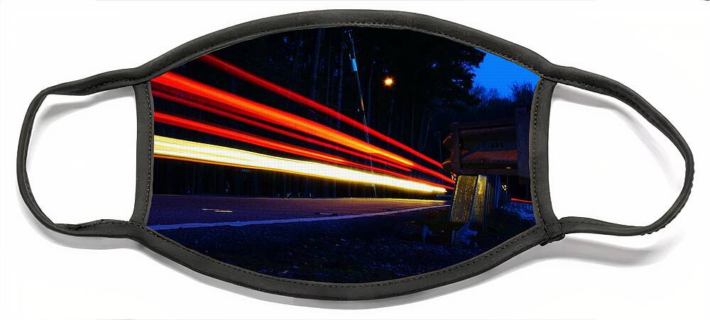 Light Trail Face Mask featuring the photograph The Trail To... by Nicole Lloyd