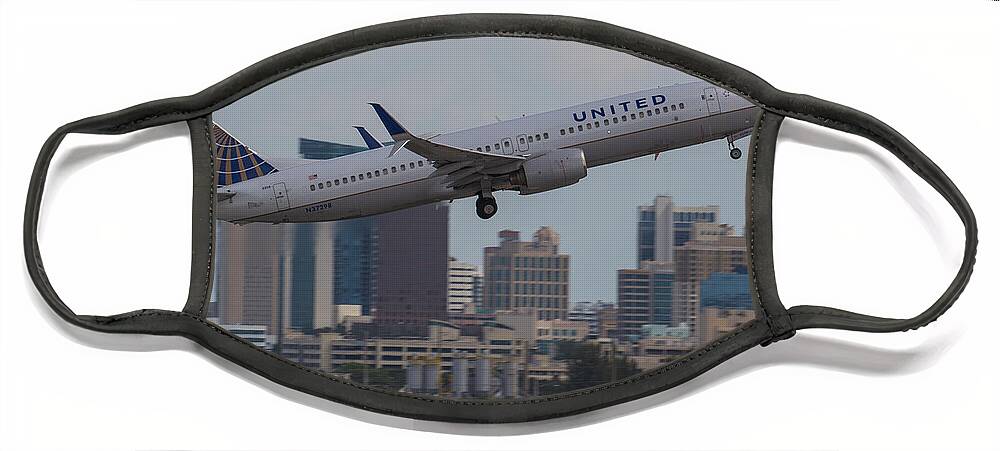 Aircraft Face Mask featuring the photograph United Airlinea by Dart Humeston