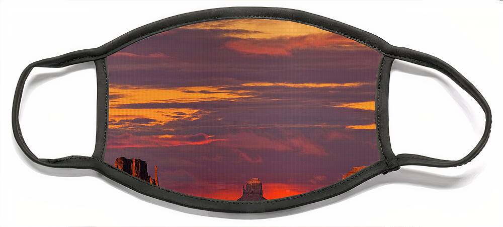 Arid Climate Face Mask featuring the photograph The Mittens and Merrick Butte at Sunset #1 by Jeff Goulden