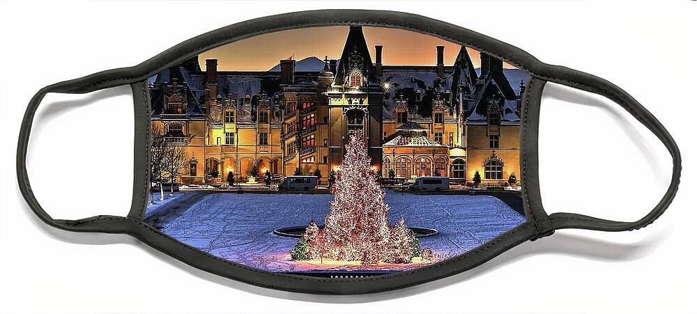 Holidays At Biltmore House Face Mask featuring the photograph Biltmore Christmas Night All Covered In Snow by Carol Montoya