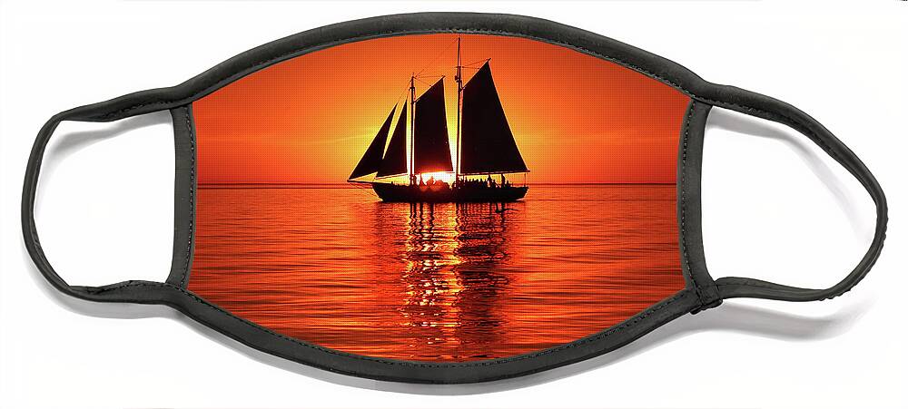 Edith M. Becker Face Mask featuring the photograph Schooner Eclipses the Sunset Square by David T Wilkinson