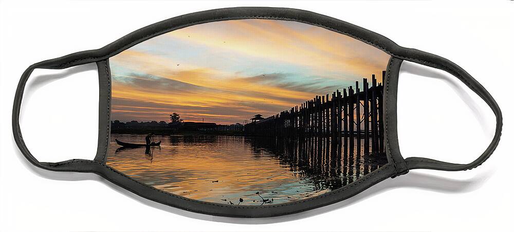 Fishing Face Mask featuring the photograph sunrise at U Bein Bridge, Mandalay, Myanmar by Ann Moore