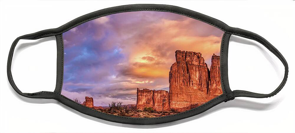 Arches National Park Face Mask featuring the photograph Sunrise on The Organ, Tower of Babel and the Three Gossips by Brenda Jacobs