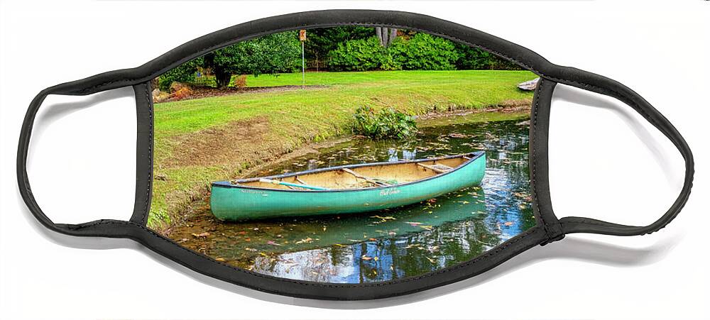 Boats Face Mask featuring the photograph Canoe on the Edge of the Lake #1 by Debra and Dave Vanderlaan