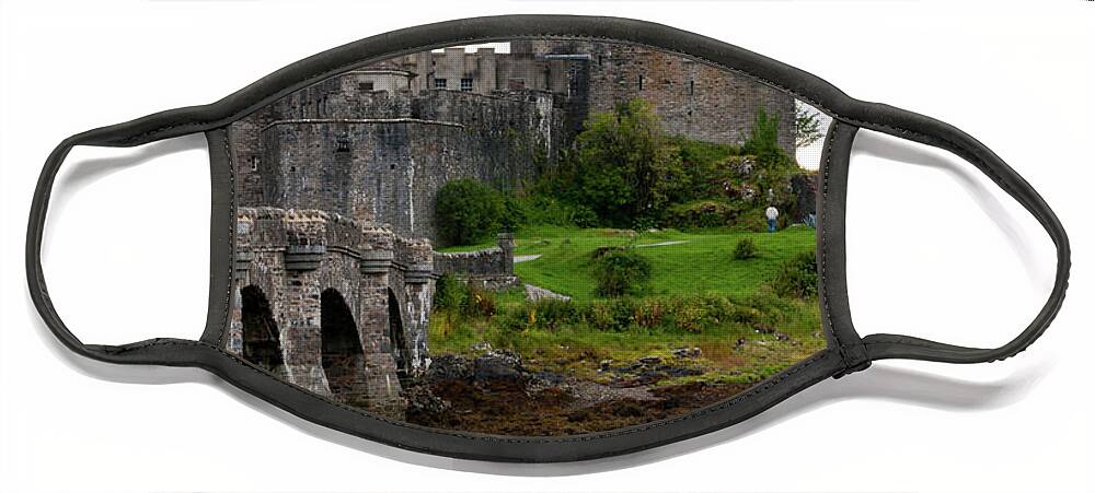 Scotland Face Mask featuring the photograph Eilean Donan Castle in the loch Alsh at the highlands of Scotlan by Michalakis Ppalis